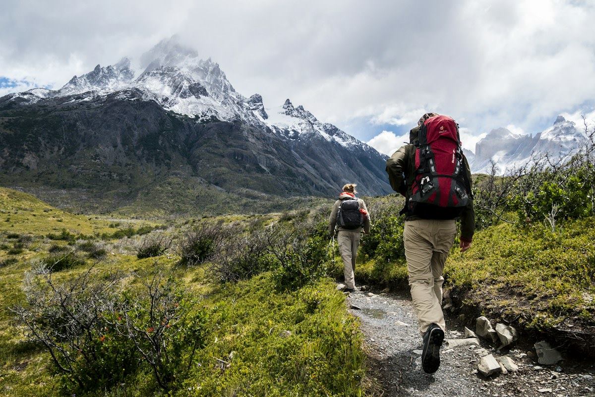 Travelers exploring an African landscape